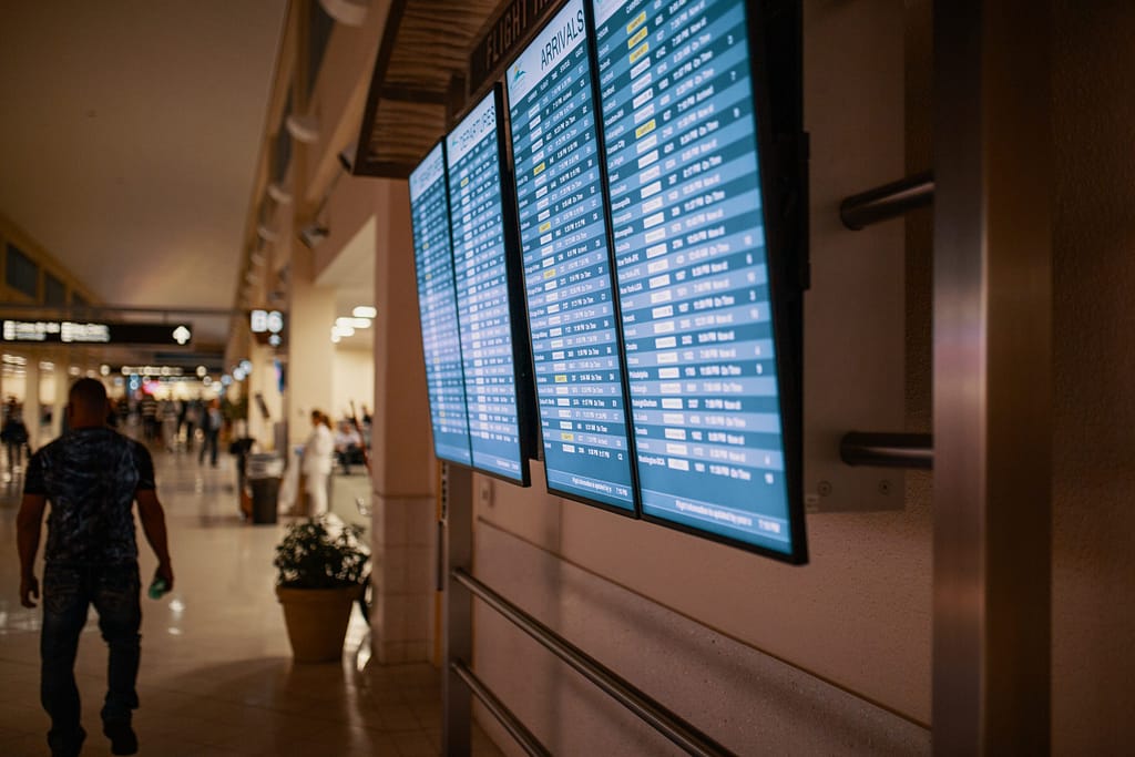 airline flight schedules on flat screen televisions 1716825 scaled